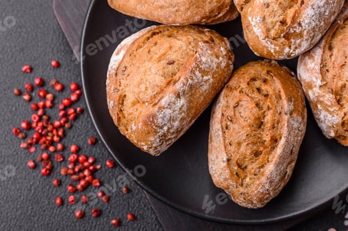 Preview: Fresh baked bread buns with salt, spices, seeds and grains