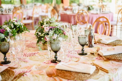 Preview: Elegant cutlery and floral arrangements for a table in a wedding restaurant with vintage