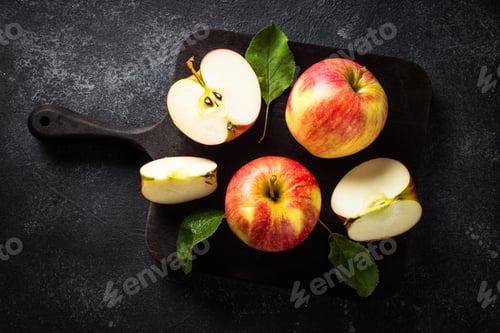 Preview: Fresh ripe red apples in the basket at white table