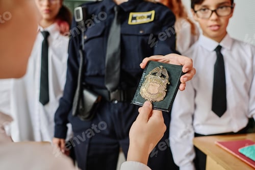 Preview: Unrecognizable Office Showing Police Badge To Kids