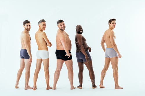 Preview: Group of multiethnic men posing for a male edition body positive beauty set