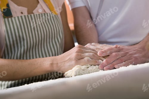 Preview: couple baking in kitchen