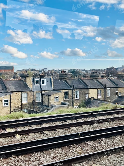 Preview: Homes and houses by the train tracks.