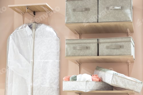 Preview: Storage Solutions: Closet Organization with Boxes and Garment Bag