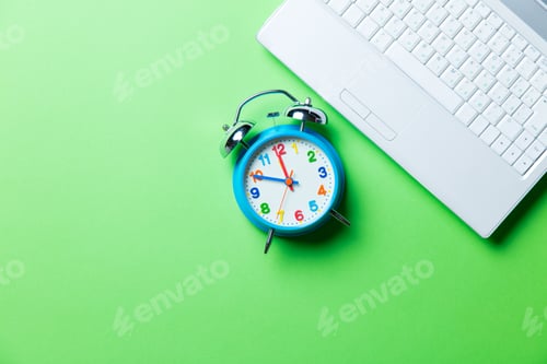 Preview: clock and laptop