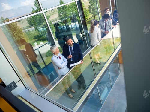 Preview: Group of business people having break on office terrace outdoor
