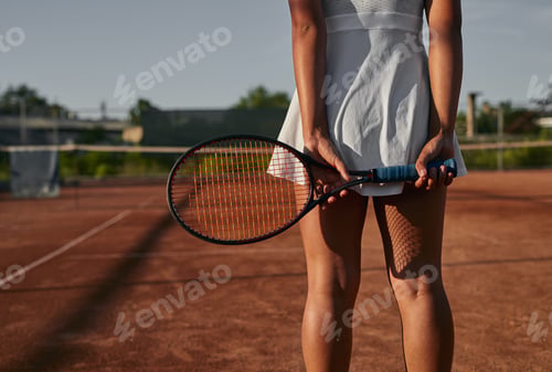 Preview: Crop black female tennis player on court