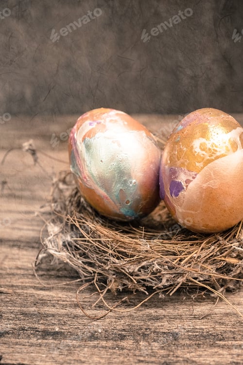 Preview: Easter Eggs In Nest On Wooden Table