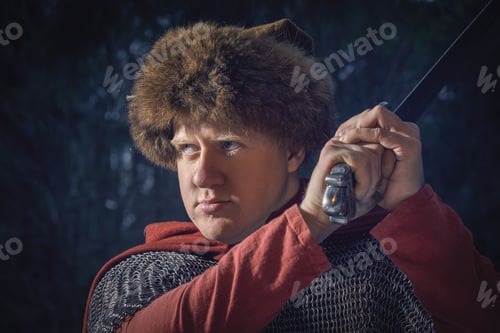 Preview: Man in warrior suit with sword in hands.