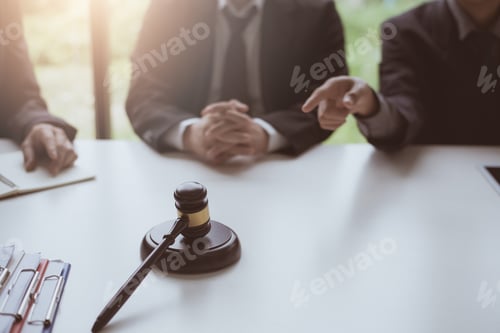 Preview: Business lawyer working about legal legislation in courtroom to help their customer.