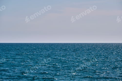 Preview: Closeup seascape surface of blue sea water with small ripple waves