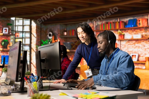 Preview: Upbeat call center senior manager evaluating new company intern performance