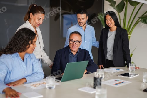Preview: Multiracial business people working on financial strategy inside office