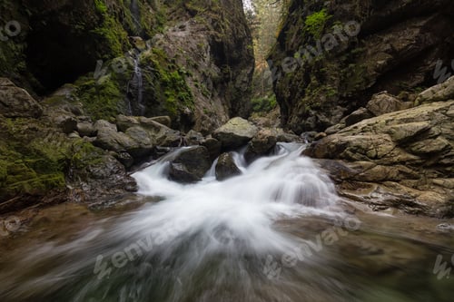 Preview: River stream in the natural canyon during the summer time. Canadian Nature Background