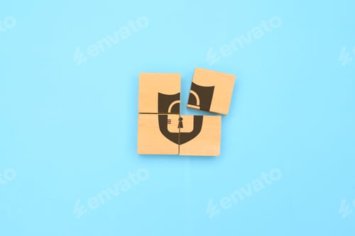 Preview: Padlock icon on wooden cube with blue background, Privacy security