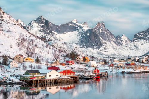 Preview: Colorful scandinavian village with snow mountain on coastline
