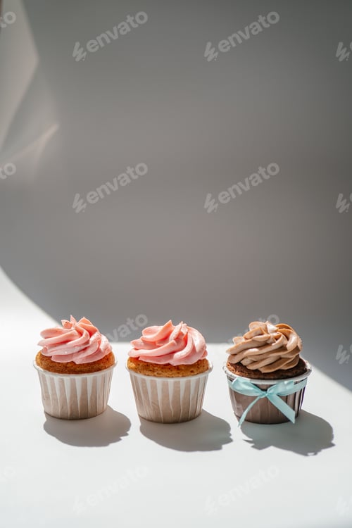 Preview: Three Sweet Cupcakes with Pink and Brown Frosting