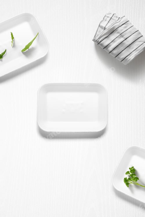 Preview: Minimalist Food Presentation with White Plates and Greens