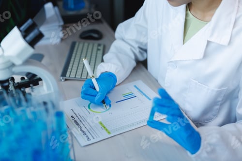 Preview: Scientist analyzing data in research laboratory