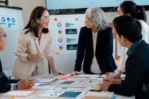 Preview: Business team discussing marketing strategy during meeting in office