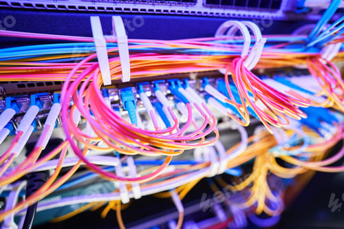 Preview: Colored fiber optic cables held together with zip ties