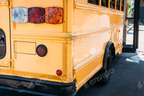 Preview: rear view of traditional american school bus