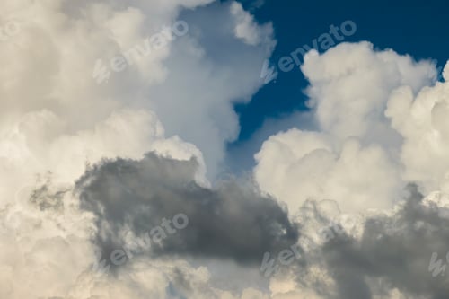 Preview: Rain clouds forming on blue Florida sky. Colorful summer skyscape