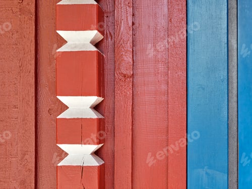 Preview: Traditional Scandinavian wooden architecture detail, red, blue and white painted wood wall