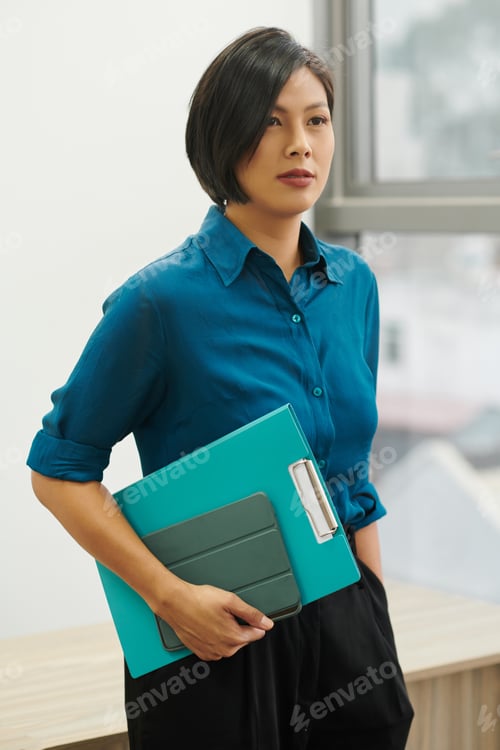 Preview: Confident Young Asian Businesswoman