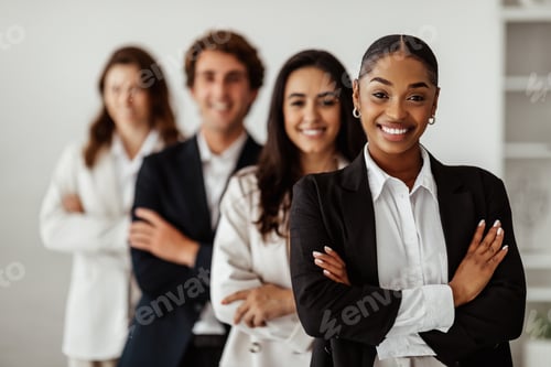 Preview: Successful business team. Happy multiethnic colleagues with female boss posing in office, standing