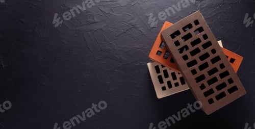 Preview: Construction brick at black plaster background. Brick and wall texture