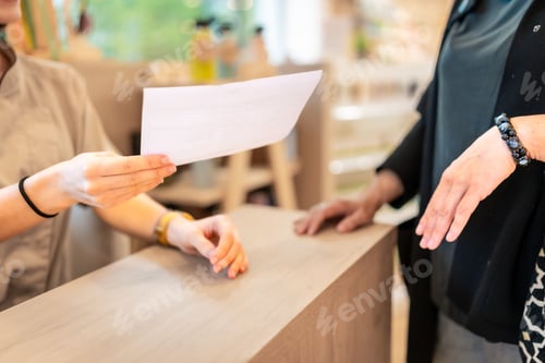 Preview: Pharmacist reading the prescription of a medicine in the store