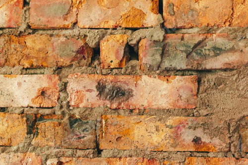 Preview: Old weathered brown brick wall for background