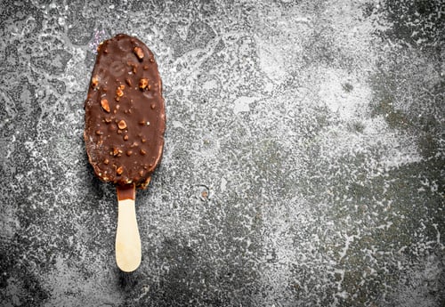 Preview: Ice cream on a stick covered with chocolate.