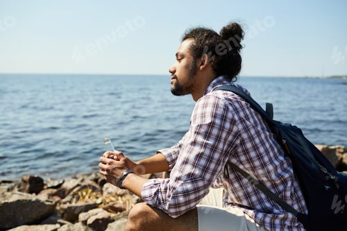 Preview: Young Man Looking at Sea