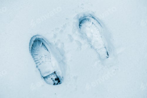 Preview: boots footprint and footstep on the snow surface isolated, winter season f