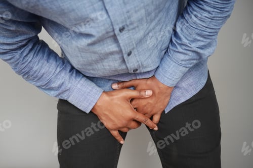 Preview: the concept of prostate and bladder problem, crotch pain of a young person