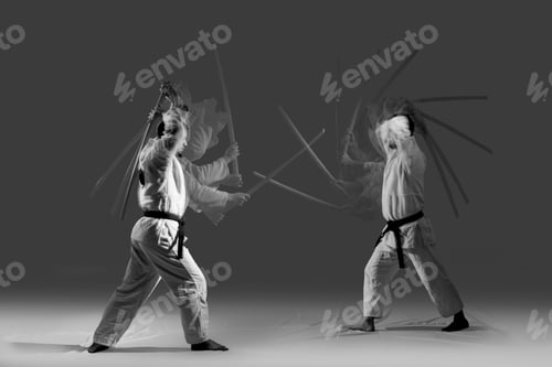 Preview: Two Caucasian Men Are Practicing Aikido With The Bokken