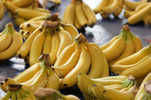 Preview: Ripe healthy bananas for sale at market.