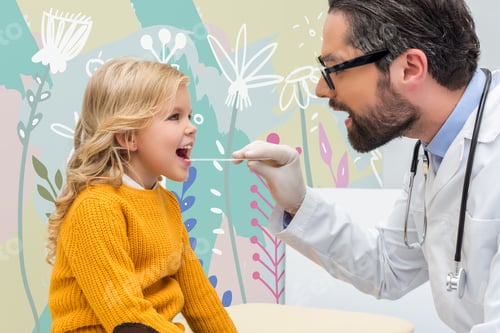 Preview: handsome young pediatrist checking throat of adorable little girl