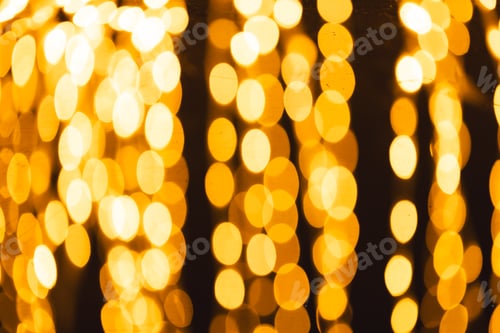 Preview: Multiple yellow bokeh lights with copy space on dark background