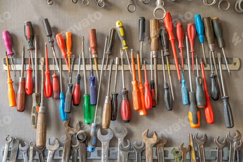 Preview: large colorful set of old wrenches and screwdriver in the DIY workshop