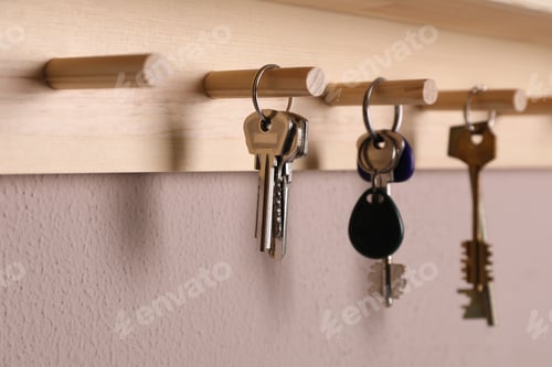 Preview: Wooden hanger for keys on color wall, closeup