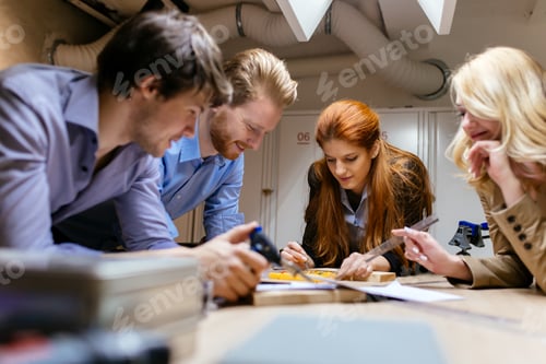 Preview: Group of creative designers brainstorming