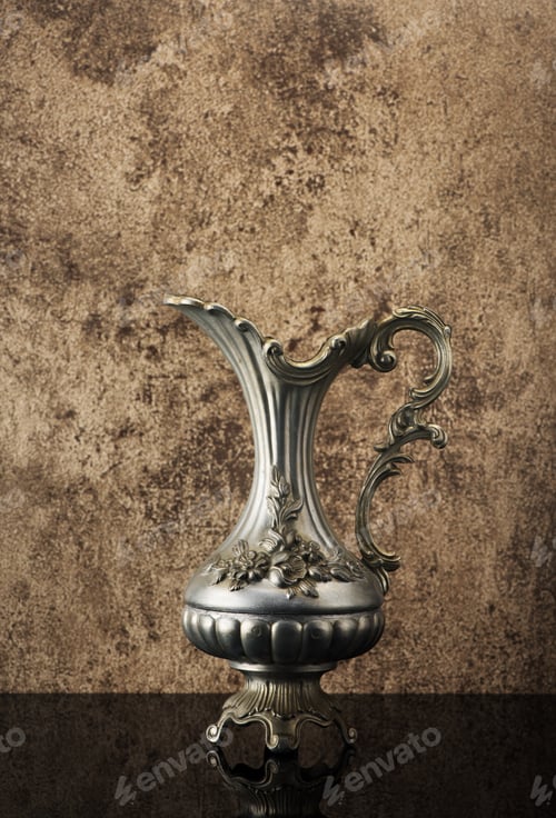 Preview: Ancient jug for wine on a stone background