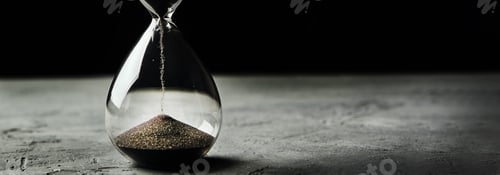 Preview: Hourglass on a dark background, long banner