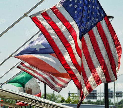 Preview: USA flag in foreground with other flags on food trucks