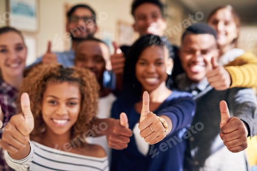 Preview: If we can do it, so can you. Portrait of a diverse group of students showing thumbs up at campus.
