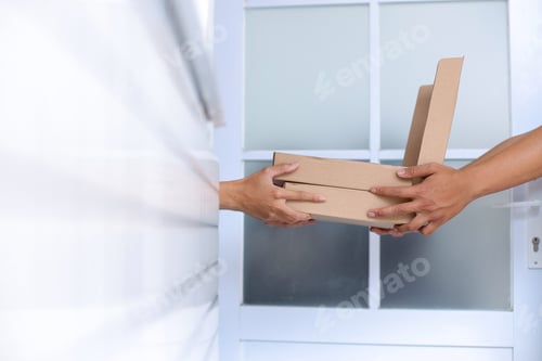 Preview: Close-up Of Deliveryman Sending Pizza Box To Customer