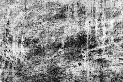 Preview: Grunge background in black and white, rough texture of an old scratched and stained messy surface